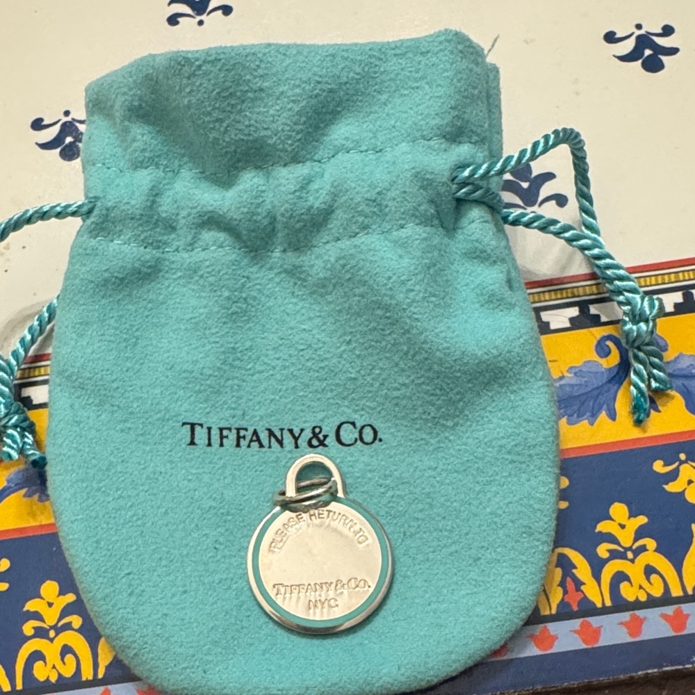 Tiffany & Co. Silver Charm with Blue Pouch